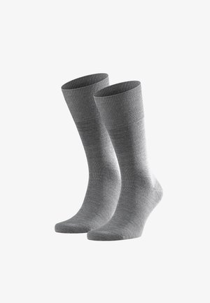 Pair of plain grey mid-calf socks with ribbed cuffs, displayed upright against a white background.