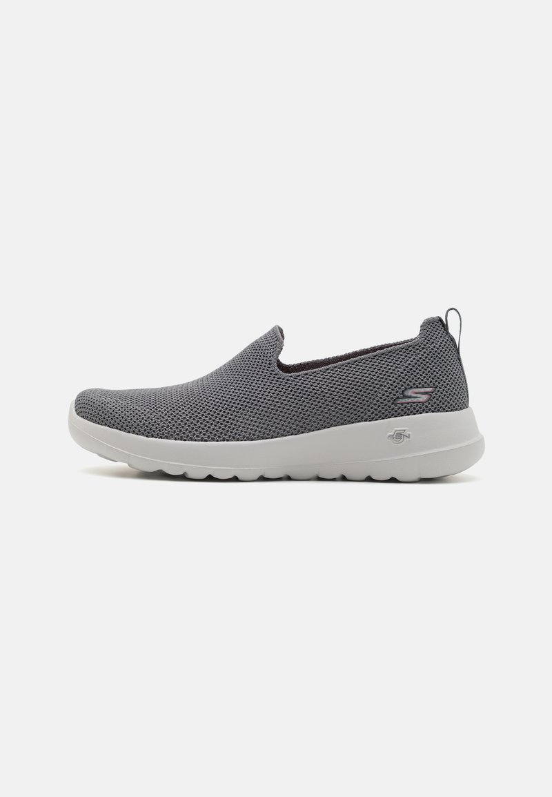 Slip-on shoes with a gray mesh upper, white rubber sole, and textured design. Features a rear pull tab and subtle logo detailing.