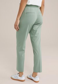 WE Fashion SLIM FIT - Kelnės - light green