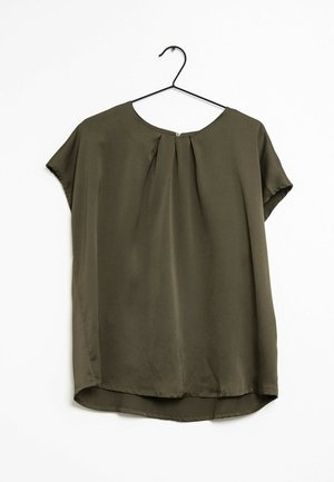 Olive green short-sleeve blouse with round neckline and pleat detail at front, hanging on a black wire hanger against white background.