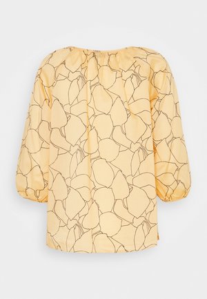 Gul blus med svart abstrakt mönster, rundad halsringning och puffärmar. Tillverkad av lättviktsmaterial med en samlad bakdesign.