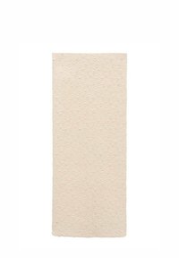 Tapis de bain texturé de couleur crème avec un motif circulaire en relief, de forme rectangulaire et en matériau moelleux, conçu pour le confort et l'absorption.