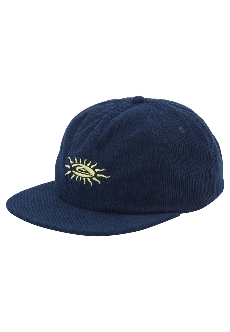 Gorra de béisbol de corduroy azul marino con visera plana, que presenta un diseño bordado de un sol amarillo y un ojo en la parte frontal. Superficie texturada.