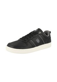 Black athletic sneakers feature a smooth synthetic upper, grey accents, laces, perforated toe, and a white rubber sole. Logo on the side.