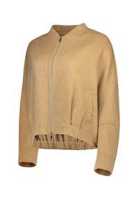 Giacca beige corta con zip frontale, orlo elastico, maniche lunghe e tasche laterali, realizzata in un tessuto morbido e texturizzato.