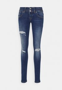 Vaqueros ajustados de denim azul oscuro con ligero desgaste. Presentan una cintura de altura media, dos bolsillos frontales y un cierre de botón.