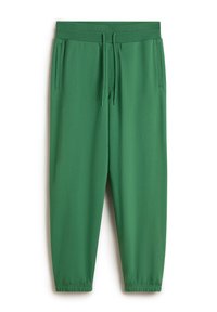 Groene trainingbroek met een trekkoord in de taille, twee zijzakken en elastische boorden bij de enkels. Gladde stof met een matte afwerking.