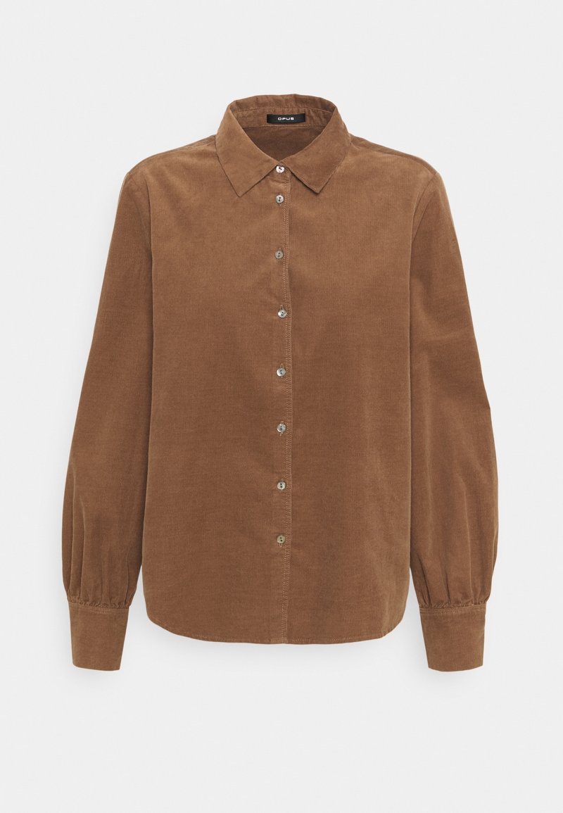Chemise marron en velours côtelé à manches longues, boutonnée devant, col classique et poignets froncés.