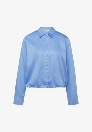 Blouse bleu clair à manches longues avec boutons, col classique et ourlet élastiqué.
