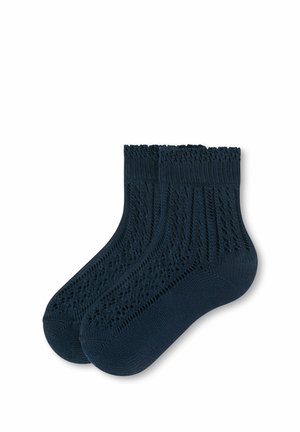Paire de chaussettes bleu foncé montant à la cheville avec un motif tricoté texturé et des bordures côtelées, présentée sur un fond blanc.