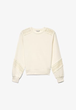 Sweat-shirt crème à manches longues avec bordure en dentelle sur les épaules et autour des manches mi-longues, poignets, ourlet et encolure ronde côtelés.
