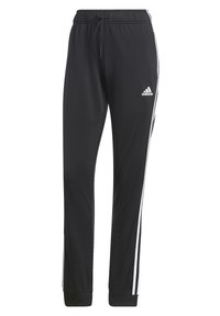 Černé sportovní kalhoty mají jemný lesk, elastický pas se stahovací šňůrkou a bílé boční pruhy. Vyrobené z lehké tkaniny.