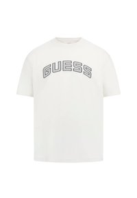 T-shirt bianco in cotone con un grande logo "GUESS" ricamato in nero sul petto. Design a maniche corte e collo rotondo.