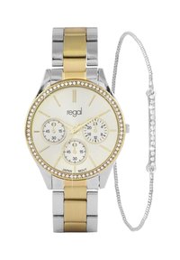 Gold- und Silbermetall-Uhr mit Kristallakzenten, weißem Zifferblatt, drei Unterzifferblättern und Gliederband. Begleitet von einem silbernen Armband mit Strasssteinen.