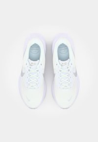 White mesh sneakers with a light gray Swoosh, round toe, lace-up design, and a translucent purple outsole. Textured upper for breathability.