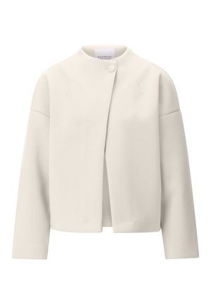 Veste couleur crème à manches longues, col rond, fermeture à un seul bouton supérieur, avec un design épuré et minimaliste.
