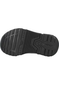 Semelle de chaussure en caoutchouc noir avec une surface texturée, présentant de profonds rainurages et un motif en zigzag pour une meilleure adhérence. Marque visible.