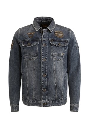 Denim jacket in dark blue with a slightly faded finish. Features two chest pockets, decorative patches, and a buttoned front closure.
