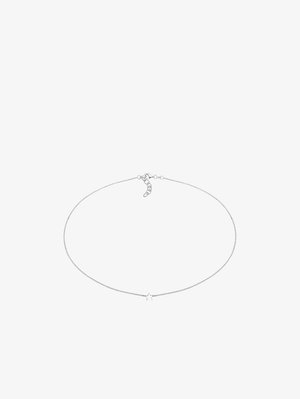 Sølv halskæde med en fin kæde, der har en lille stjerne pendentiv. Glat metallisk finish og justerbar lukning med flere længdeindstillinger.