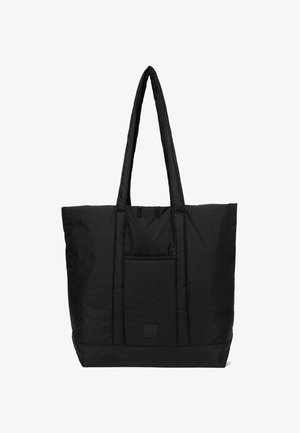 Zwarte instap tas van nylon, met een ruime hoofdcompartiment, twee lange handvatten en een voorvak met een logo-detail.