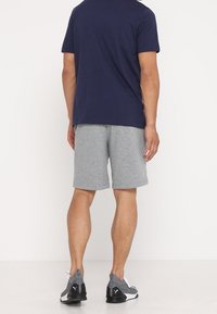 Puma Triko s potiskem - dark blue