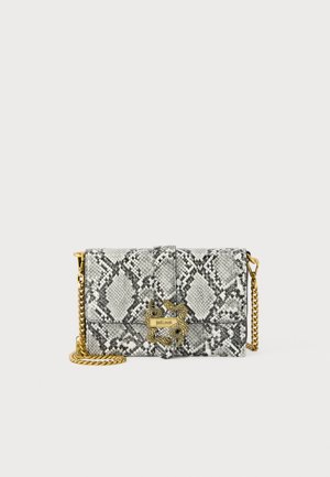 Small rectangular crossbody bag with gray snake print, gold chain strap, and gold snake-shaped clasp.