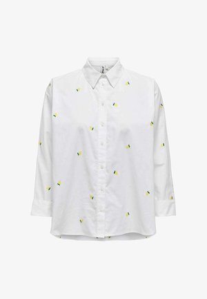 White button-up shirt with long sleeves, featuring yellow and green embroidered patterns resembling pineapples throughout. Smooth fabric texture.