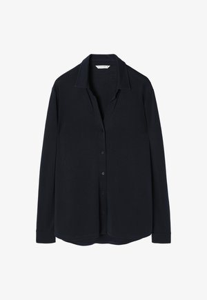 Camicia navy a maniche lunghe con colletto morbido, bottoni frontali e orlo curvo. Realizzata in un tessuto morbido e levigato, priva di fantasie.