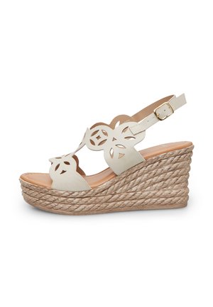 High heeled sandals - beige
