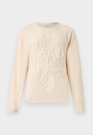 Μπεζ πλεκτό πουλόβερ με μακριά μανίκια και ανάγλυφο αφηρημένο ανθικό μοτίβο στο μπροστινό μέρος, με στρογγυλή λαιμόκοψη και ribbed μανσέτες και στρίφωμα.
