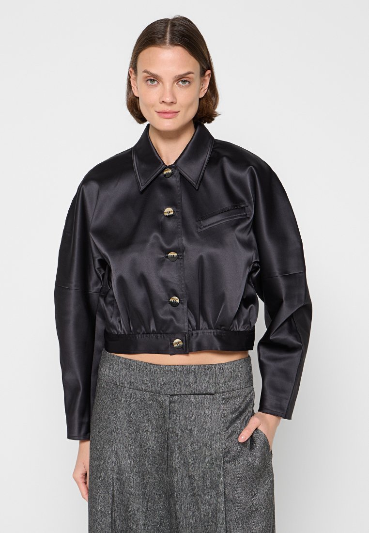 Ganni Lichte jas zwart