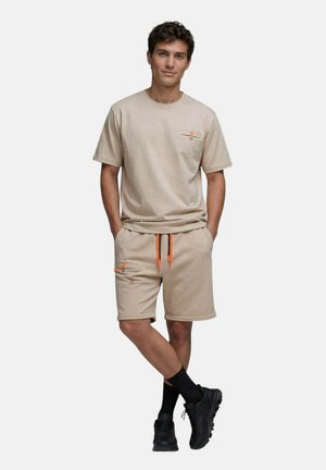 Saē, BERMUDA SAFI BEIGE NUDE HOMME - Pantalon de survêtement - beige nude