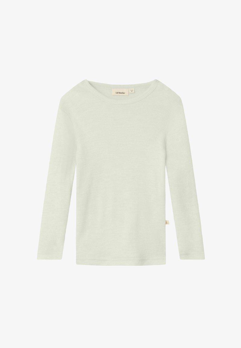 Hele rohelise tooniga pikade varrukatega särk, mis on valmistatud soonikkoes kangast. Omab laiendatud kaelust ja väikest sildi madalal küljel. Lihtne ja diskreetne disain.