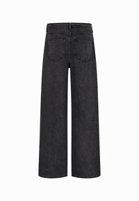 Svarta vida jeans i denim med hög midja, fyra fickor och synliga sömmar. Bakifrån visas fickor och sömmar.