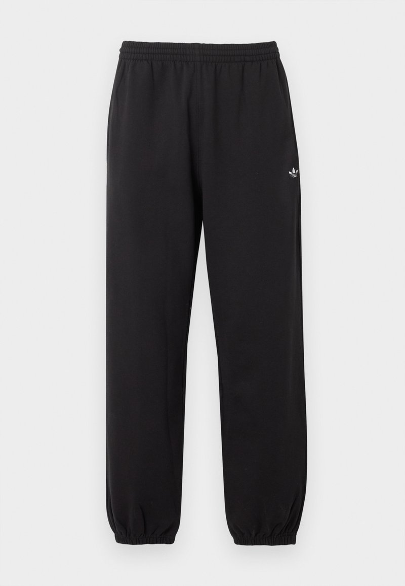 Schwarze Adidas-Sweathosen mit elastischem Bund und Bündchen, versehen mit einem kleinen weißen Adidas-Trefoil-Logo am oberen linken Bein.