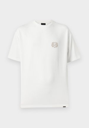 T-shirt branca de manga curta feita de algodão, apresentando um pequeno logotipo bege do lado esquerdo do peito e um decote redondo.