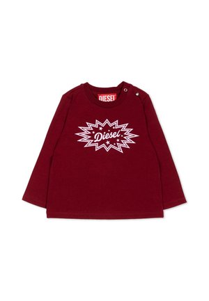 T-shirt manches longues rouge foncé pour tout-petit avec logo Diesel blanc en motif explosion d'étoile et boutons-pression sur une épaule.