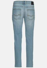 Light blue denim jeans with a slim fit, featuring two back pockets with curved stitching and a belt loop. Smooth texture and standard length.