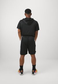 Puma SHOT BLOCKER SHORT - Pantalón corto de deporte - black white