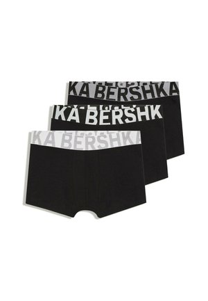 Tre par sorte boxershorts med brede elastiske linninger i sort og hvid, hver med mærkenavnet i store fede bogstaver.