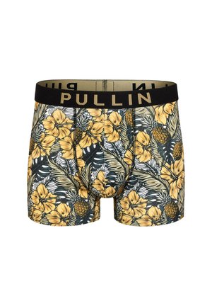 Un caleçon avec une ceinture noire portant "PULLIN" en doré ; décoré de motifs floraux jaunes et de feuilles vertes sur un fond blanc.
