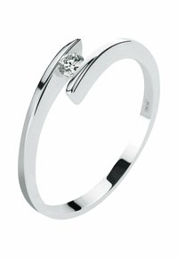 Silver open band ring with a single round diamond held between two curved ends.