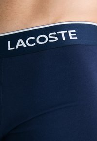 Lacoste UNDERWEAR TRUNK - Onderbroeken - navy blue/overview/liamone/green/red-navy blue