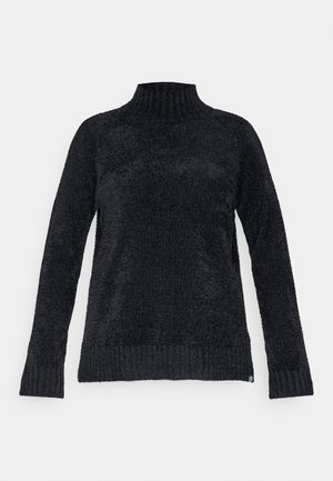 Suéter de cuello alto negro hecho de un material suave y texturizado. Presenta mangas largas y un dobladillo acanalado, con un ajuste relajado y diseño sin costuras.