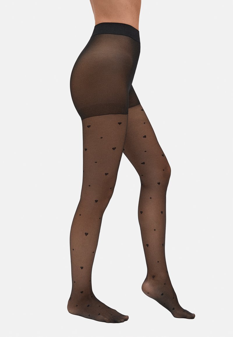 Tights semi-opacos negros con pequeños patrones de corazones negros, cintura alta, textura suave y diseño sin pies.