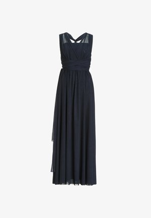 Pitkä tummansininen mekko, jossa on V-pääntie, kerros läpikuultavaa kangasta ja kietaisumallinen yläosa ristikkäisillä olkaimilla.