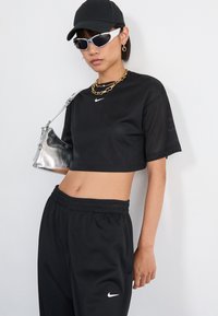 Nike Sportswear PANT COORD - Donji dijelovi trenirke - black