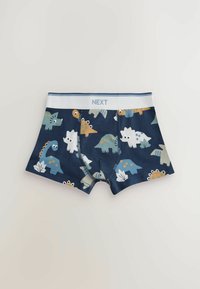 Killeboxers i marinblått med dinosaurmönster. Tillverkade av mjuk tyg, med ett vitt elastiskt midjeband med "NEXT"-logotyp.