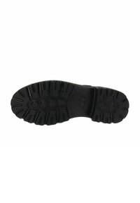 Suela de zapato de goma negra con un patrón de relieve resistente para una mejor tracción, con formas hexagonales y rectangulares para un mejor agarre.