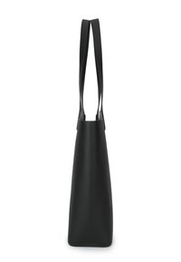 Black leather tote bag with a textured finish, featuring two long straps, angular shape, and an open top design.